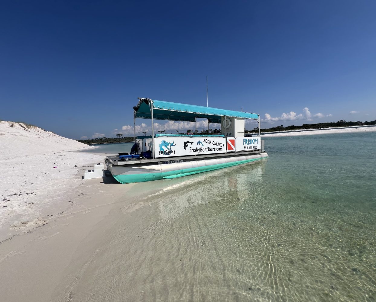 secluded beach with a boat beached for shelling